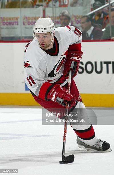 Justin Williams of the Carolina Hurricanes skates with the puck during the game against the Philadelphia Flyers on January 17, 2006 at the Wachovia...