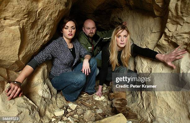 Director Neil Marshall, actress Nora Jane Noone and actress Shanua Macdonald pose for portraits outside a cave entrance during the 2006 Sundance Film...