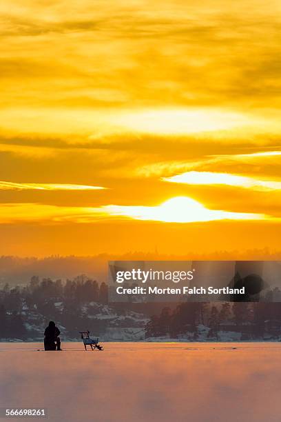 ice fisherman - bærum stock pictures, royalty-free photos & images