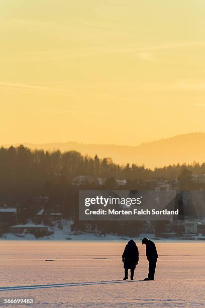 walking on the ice - bærum stock pictures, royalty-free photos & images