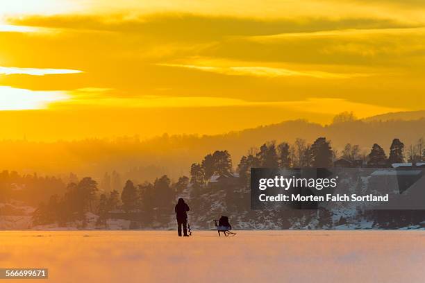 ice fisherman - bærum stock pictures, royalty-free photos & images