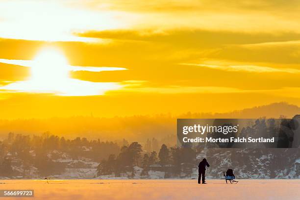 ice fisherman - bærum stock pictures, royalty-free photos & images