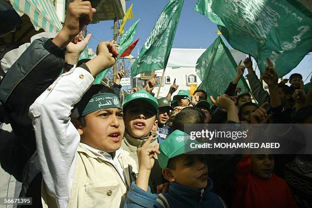 Palestinian supporters of Hamas celebrate in the southern Gaza Strip refugee camp of Khan Yunes, 26 January 2006. The radical Islamist movement Hamas...