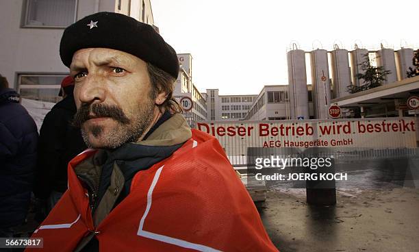 Albert Reichenberg, employee of German electrical appliances maker AEG, pickets in front of his company's plant in Nuremberg, southern Germany, 26...