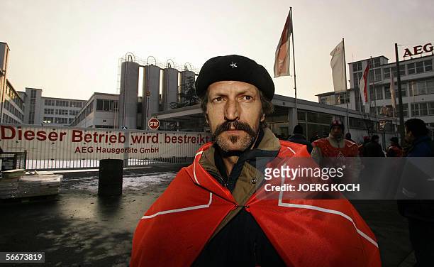 Albert Reichenberg, employee of German electrical appliances maker AEG, pickets in front of his company's plant in Nuremberg, southern Germany, 26...