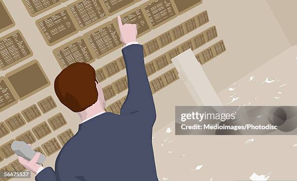 rear view of a businessman pointing - trading floor stock illustrations