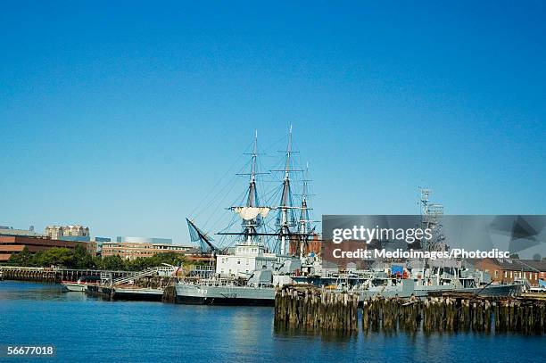 sailboats in the river, uss cassin young, boston harbor, boston, massachusetts, usa - boston harbour stock pictures, royalty-free photos & images