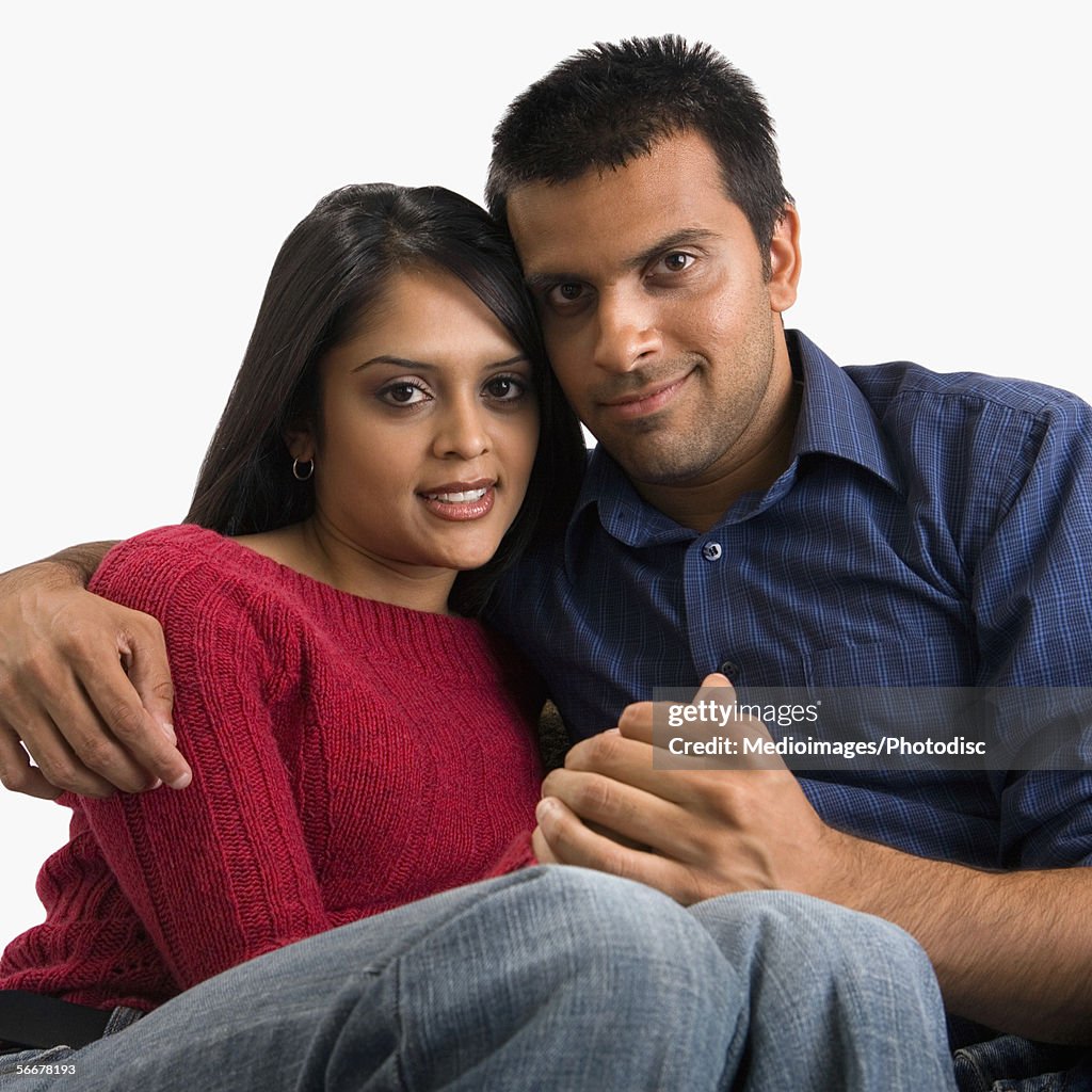 Portrait of a young couple sitting together