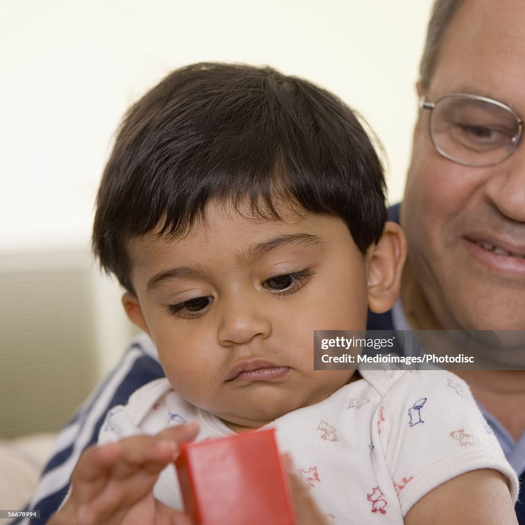 Close-up of a grandfather with his grandson