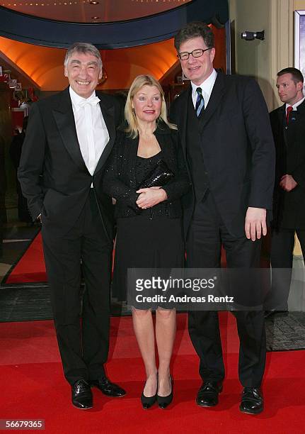 Actor Gottfried John , wife Brigitte John and Roger Willemsen arrive for the Diva Awards at the Deutsches Theater on January 26, 2006 in Munich,...