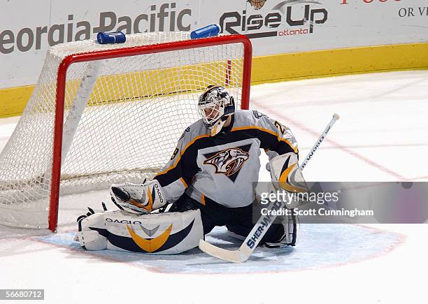 Tomas Vokoun of the Nashville Predators makes a pad save against the Atlanta Thrashers during their game on January 11, 2006 at Philips Arena in...