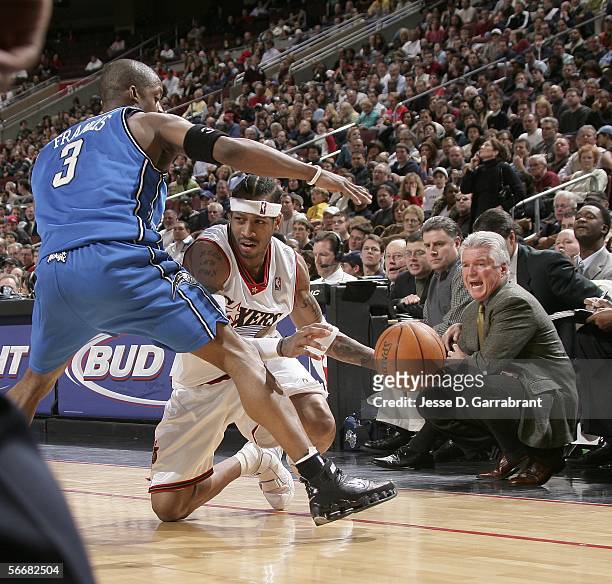 Allen Iverson of the Philadelphia 76ers attempts to pass against Steve Francis of the Orlando Magic on January 26, 2006 at the Wachovia Center in...