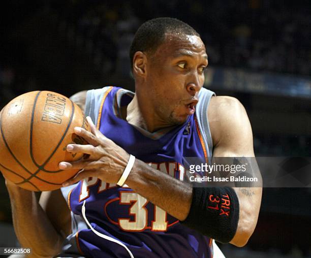 Shawn Marion of the Phoenix Suns grabs a rebound during a game against the Miami Heat on January 26, 2006 at American Airlines Arena in Miami,...