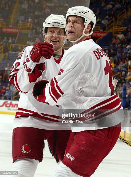 Dennis Seidenberg and Boyd Devereaux of the Phoenix Coyotes celebrate a goal in the second period against the St. Louis Blues on January 26, 2006 at...