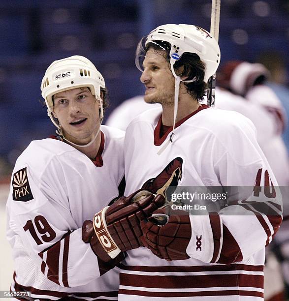 Shane Doan and Mike Ricci of the Phoenix Coyotes celebrate at the end of the game on January 26, 2006 at the Savvis Center in St. Louis, Missouri....