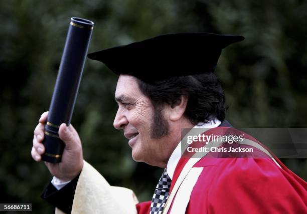 Legendary singer Engelbert Humperdinck poses with his honorary Doctor Of Music degree from the University Of Leicester's latest postgraduate degree...