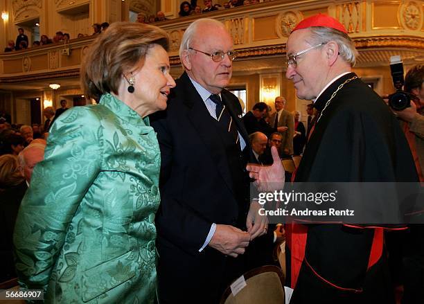 Austrian archbishop Alois Kothgasser welcomes former German President Roman Herzog and his wife at the opening of the Mozart week at the Mozarteum...