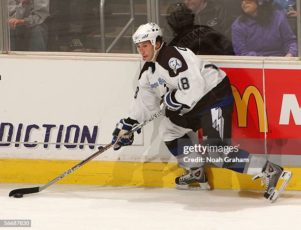 Rob DiMaio of the Tampa Bay Lightning skates with the puck against the Los Angeles Kings during the NHL game on January 17, 2006 at the Staples...