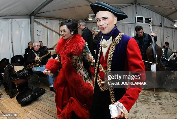 Austrian actors Stemberger and Christian Satlecker, hosting a gala night, warm up backstage along with other performers, during a cultural...