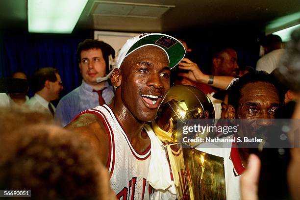 Michael Jordan of the Chicago Bulls celebrates after Game 6 of the NBA Finals against the Portland Trail Blazers on June 14, 1992 at Chicago Stadium...