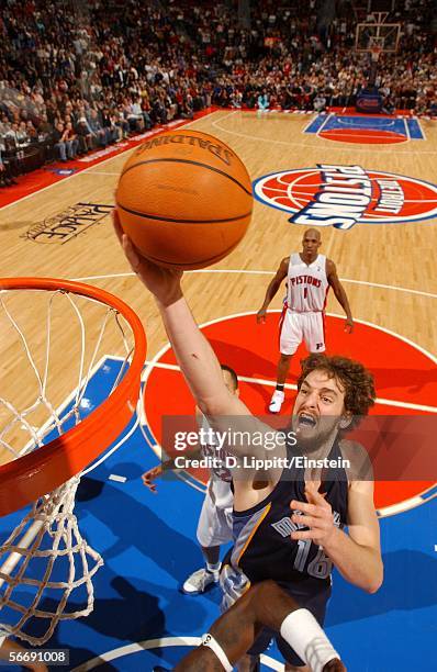 Pau Gasol of the Memphis Grizzlies lays up against the Detroit Pistons in a game on January 27, 2006 at the Palace of Auburn Hills in Auburn Hills,...