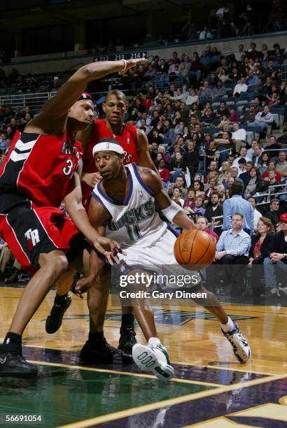 Ford of the Milwaukee Bucks drives to the basket against Charlie Villanueva of the Toronto Raptors January 27, 2006 at the Bradley Center in...