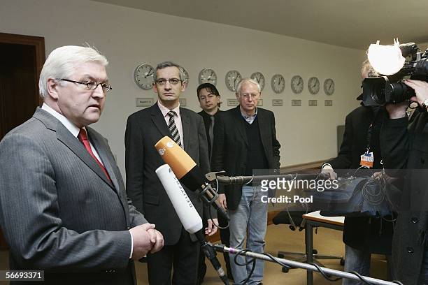 German Minister of Foreign Affairs Frank-Walter Steinmeier speaks to reporters as he visits the crisis reaction centre in the foreign ministry, about...
