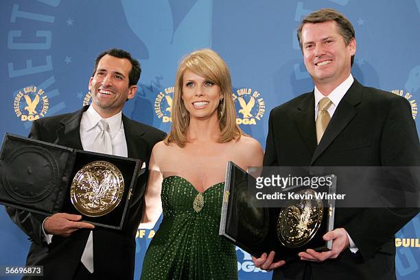 Director Tony Croll, presenter actress Cheryl Hines and Director J. Rupert Thompson pose with their tie award for Outstanding Directorial Acheivement...