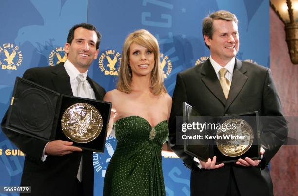 Director Tony Croll, presenter actress Cheryl Hines and Director J. Rupert Thompson pose with their tie award for Outstanding Directorial Acheivement...