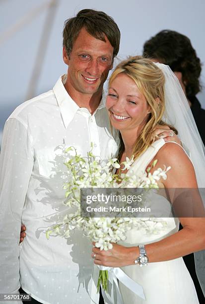 Newlyweds Tony Hawk and Lhotse Merriam pose for a photo at their wedding ceremony January, 12 2006 on the Island of Tavarua in Fiji.