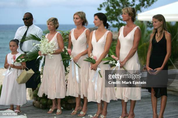 Bridesmaids Raven, Stefenie, Sarah, Kate, Kim, and Sage look on as Tony Hawk and Lhotse Merriam are read their wedding vows during the wedding...