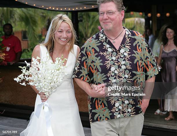 Jim, the uncle of the bride walks Lhotse Merriam down the aisle at her wedding ceremony January, 12 2006 on the Island of Tavarua in Fiji.