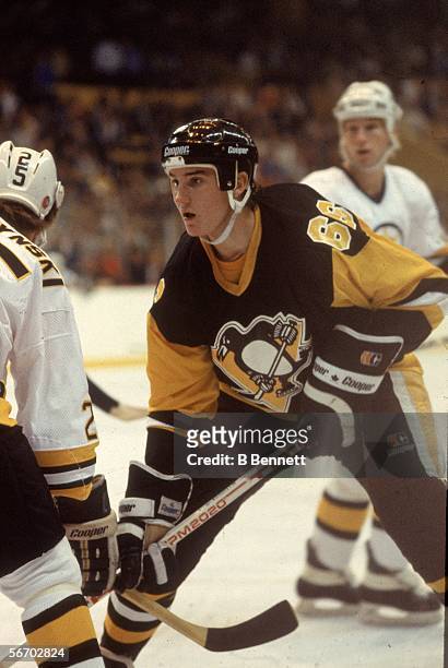 Canadian hockey player Mario Lemieux of the Pittsburgh Penguins faces off during his first NHL game against the Boston Bruins, Boston, Massachusetts,...