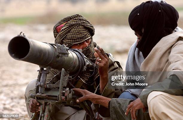 Guerrilla from the Marri tribe prepares BM12 missile launcher for firing on a Pakistani troop outpost near Kahan in the Pakistani province of...