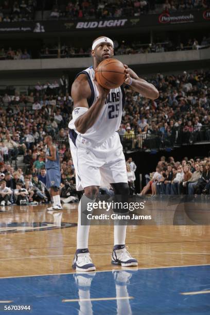 Erick Dampier of the Dallas Mavericks shoots a free throw during the game against the Minnesota Timberwolves at American Airlines Arena on January 7,...