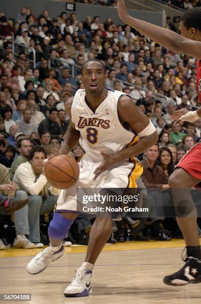 Kobe Bryant of the Los Angeles Lakers drives to the basket against the Toronto Raptors on January 22, 2006 at Staples Center in Los Angeles,...