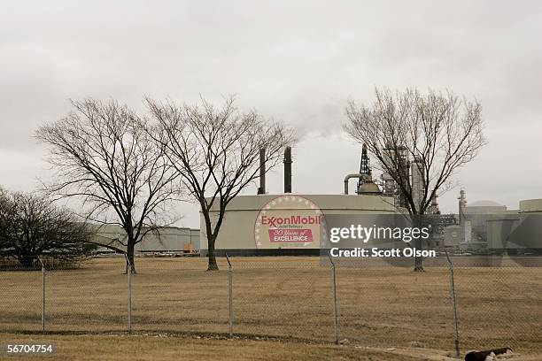 The Exxon Mobil logo is painted on a storage tank at the Exxon Mobil Corp. Refinery January 30, 2006 in Joliet, Illinois. Exxon Mobil posted a record...