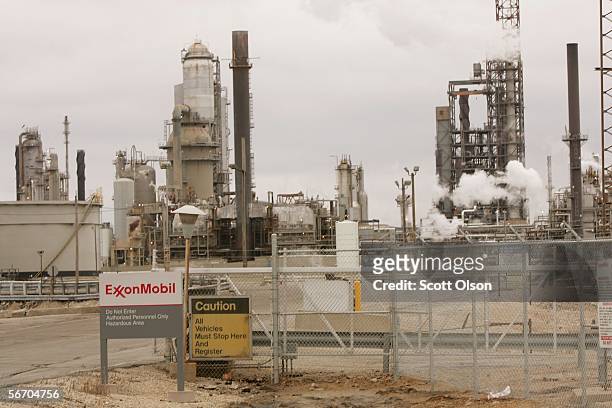 The smoke and steam billows from the stacks at the Exxon Mobil Corp. Refinery January 30, 2006 in Joliet, Illinois. Exxon Mobil posted a record...
