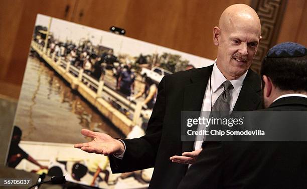 Standing in front of a photo of flooded New Orleans, William Lokey , chief of the Federal Emergency Management Agency's Response Division's...