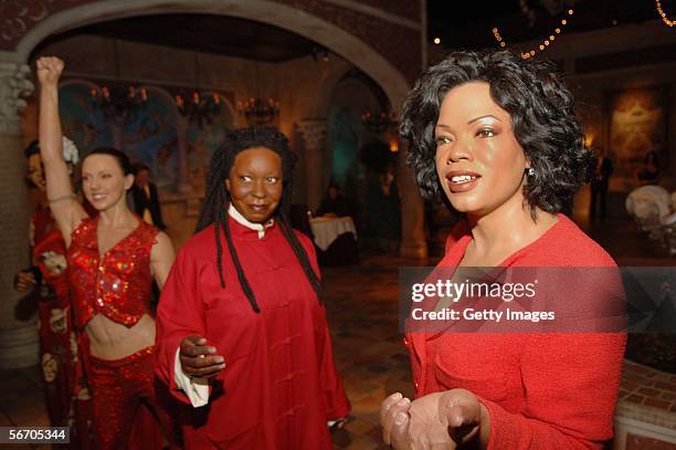 Wax Statues are dressed in red at the American Heart Association Go Red for Women Campaign at Madame Tussauds on January 30, 2006 in New York City....