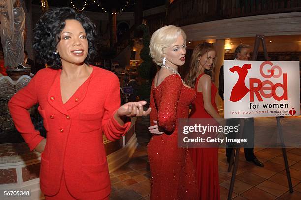 Wax Statues are dressed in red at the American Heart Association Go Red for Women Campaign at Madame Tussauds New York City on January 30, 2006 in...