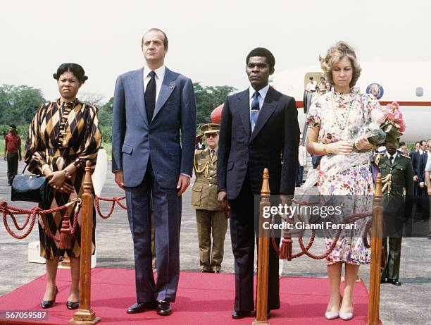 In their official trip to Equatorial Guinea, the Spanish Kings Juan Carlos of Borbon and Sofia of Greece are greeted at the airport of Malabo by the...