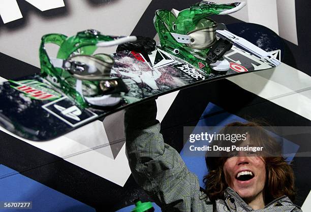 Shaun White of Carlsbad, California takes the podium after he won the gold medal in the Men's Snowboard Superpipe at Winter X Games 10 on January 30,...