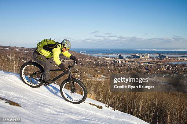 man fatbiking - duluth minnesota stock pictures, royalty-free photos & images