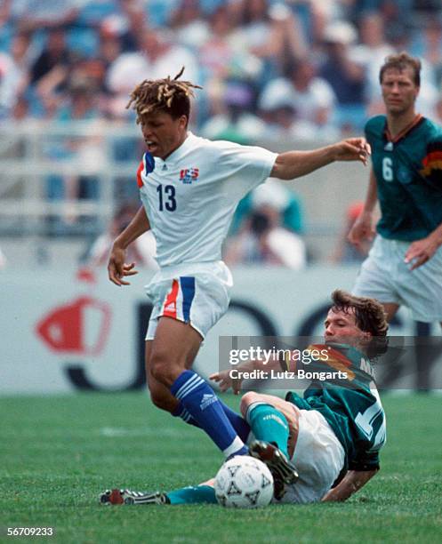 Cobi Jones of USA and Lothar Matthaeus of Germany in action during the US Cup match between Germany and USA on June 13, 1993 in Chicago, United...