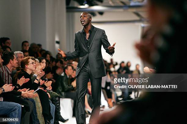 Givenchy's designer British Oswald Boateng is seen on the catwalk at the end of the presentation of Givenchy men's ready-to-wear Autumn/Winter...