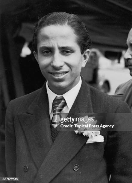 King Faisal II of Iraq arrives at London Airport for a new term at Harrow School, 10th May 1950.