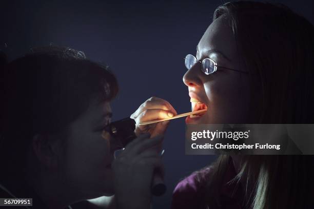 Nurse at Manchester Piccadilly walk-in NHS centre treats a commuter on January 31 Manchester, England. The commuter walk-in centre, operated by...