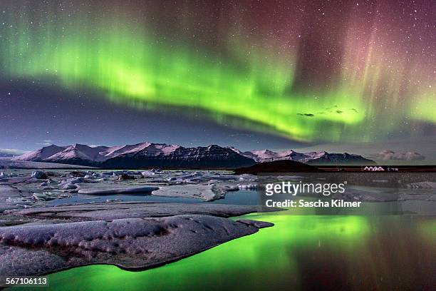aurora borealis on iceland - reykjavik winter stock pictures, royalty-free photos & images