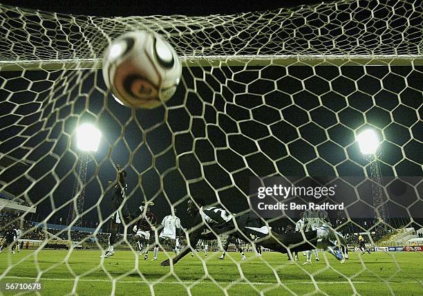 Gabriel Issah of Ghana heads the ball into his own net to give Zimbabwe the lead during The African Cup of Nations, Group D match between Ghana and...